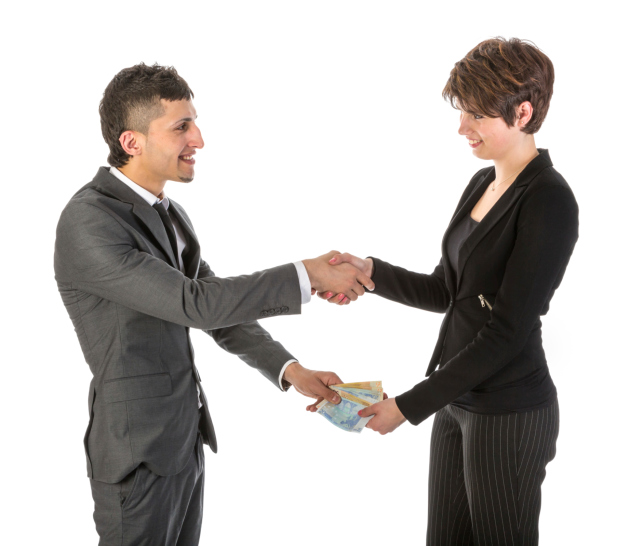 Businessman is paying businesswoman