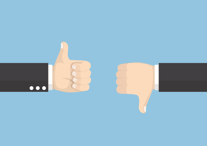 Businessman hands showing thumb up and thumb down