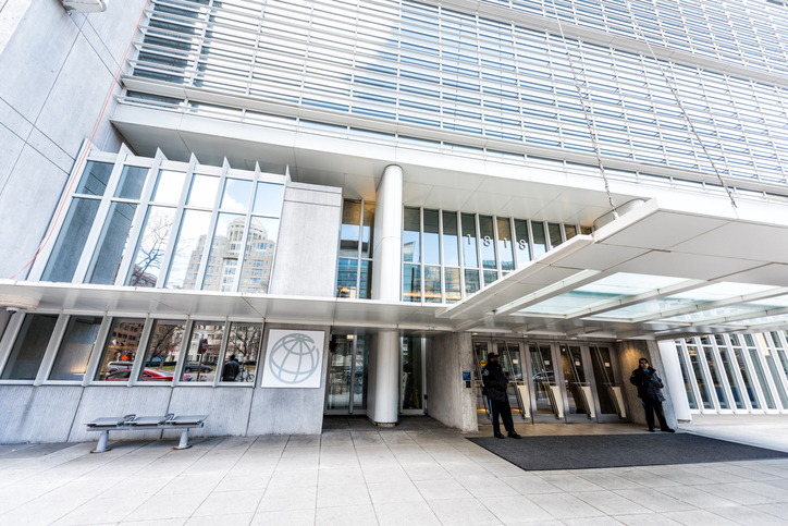 World Bank Group entrance, sign and logo with security guards by entrance doors, winter international financial building