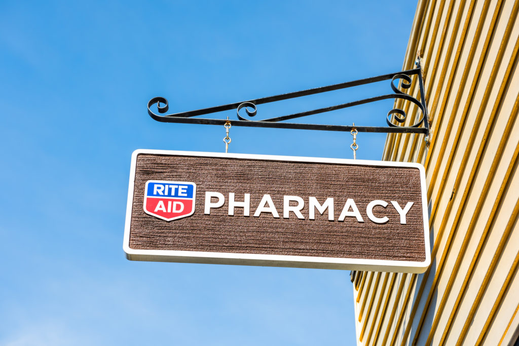 Rite Aid Pharmacy sign in old town village in Maine closeup isolated